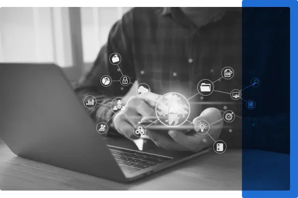 A black and white image of a laptop with artificial intelligence icons