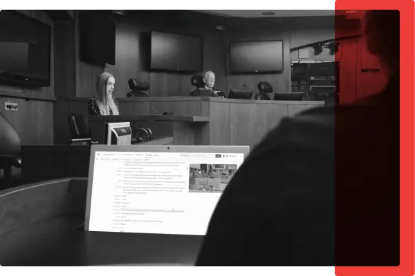 A black and white image of a speech-to-text platform in use in a courtroom